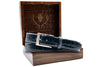 Hand Glazed Genuine American Alligator Belt - Sapphire in front of open Martin Dingman Solid Wood Display Box lined with Alligator Grain Leather.