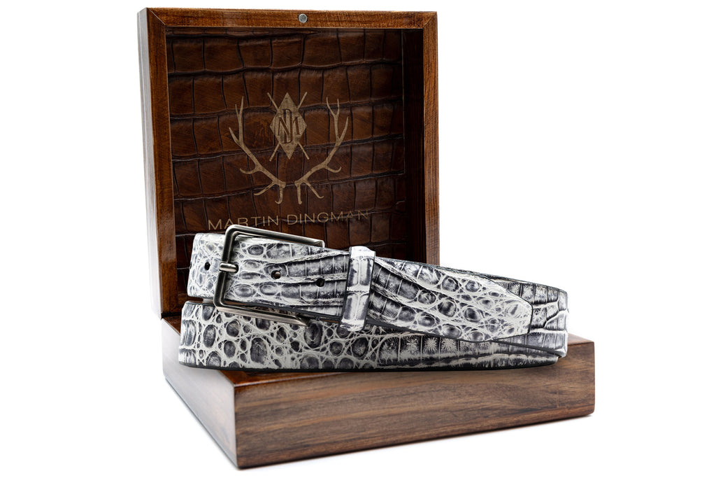 Hand Painted Genuine Caiman Crocodile Belt - Pewter in front of open Martin Dingman Solid Wood Display Box lined with Alligator Grain Leather.