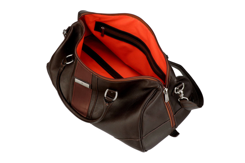 Front Side View of Open Rudyard Tumbled Saddle Leather Polocrosse Duffel - Chocolate featuring Signature Orange Cotton Twill Lining
