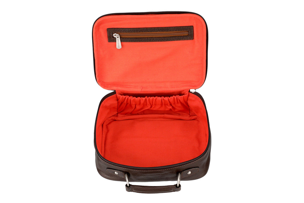 Top view of open Rudyard Tumbled Saddle Leather Journey Shave Case - Chocolate featuring Water Resistant Signature Orange Nylon Lining