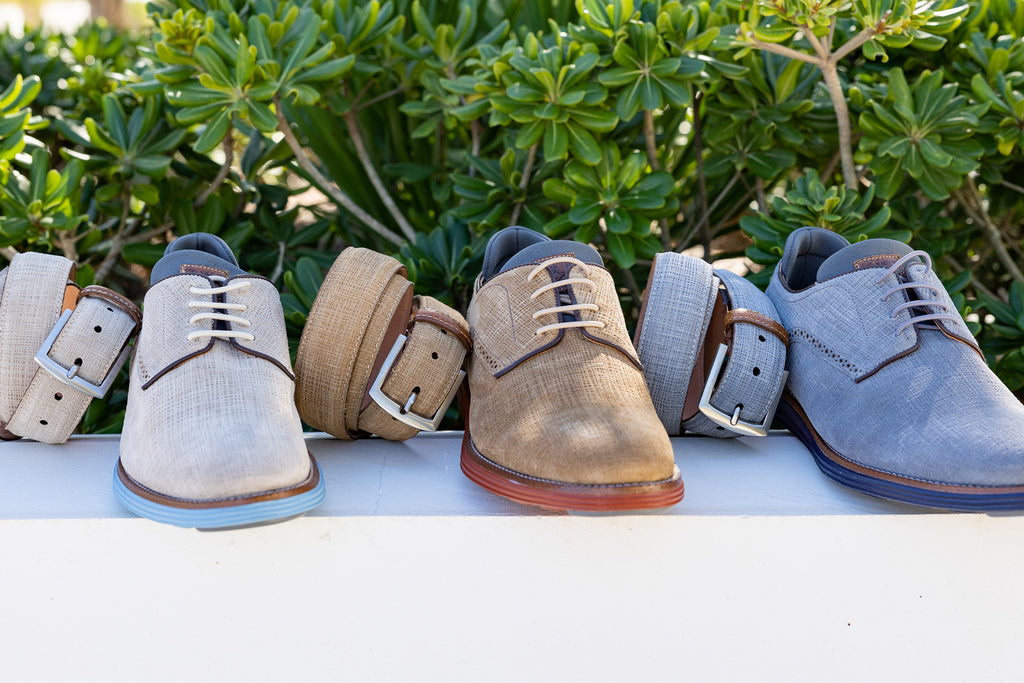 Countryaire Nubuck Belts next to Countryaire Nubuck Plain Toe Shoes in the colors Bone, Camel, and Dolphin Grey 