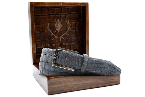Nubuck Genuine American Alligator Belt - Sapphire in front of Martin Dingman Solid Wood Display Box