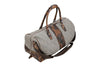 Back View of Woodland Quilted Oxford Canvas Duffel - Stone with Camo Saddle Leather Trim