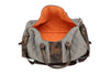Back View of Woodland Quilted Oxford Canvas Duffel - Stone with Camo Saddle Leather Trim with Clamshell Zipper Open featuring Signature Orange Cotton Twill Lining