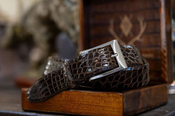 Hand Glazed Genuine American Alligator Belt - Walnut rolled up in open Martin Dingman Solid Wood Display Box