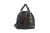 Side view of Lexington Tumbled Saddle Leather Duffel in the color Chocolate