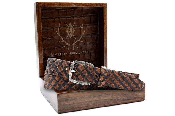Genuine Amazonian Arapaima Belt - Blackened Walnut in front of Martin Dingman Solid Wood Display Box