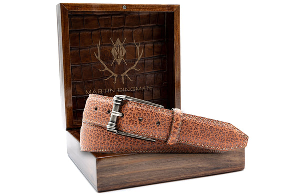 Genuine American Plains Bison Belt - Chestnut in front of Martin Dingman Solid Wood Display Box