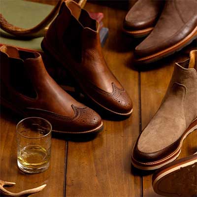 Martin Dingman boots on a wooden table