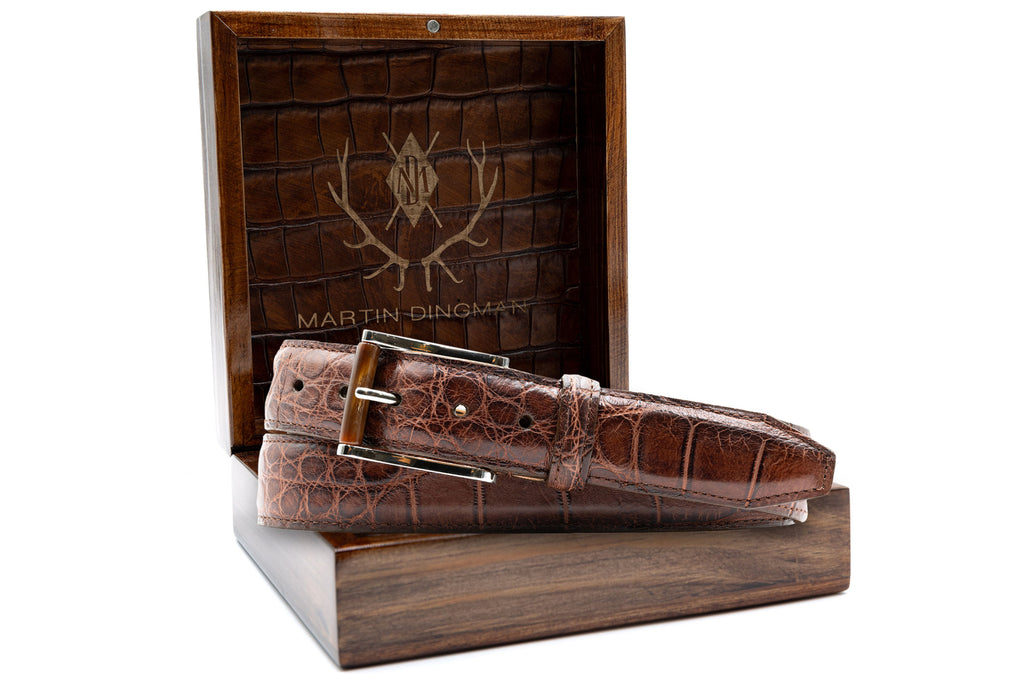 Matte Genuine American Alligator Belt - Chestnut in front of Martin Dingman Solid Wood Display Box