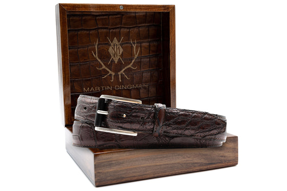 Vintage Genuine American Alligator Belt - Old Walnut in front of an open Martin Dingman Solid Wood Display Box